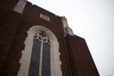 Monastery Window with Gothic Arch and Cross