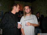 Two Men Enjoying a Drink at the Pub