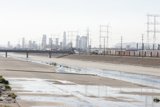 Urban River with Power Lines