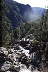 Mountain Stream Cascading Through Rocky Granite Canyon