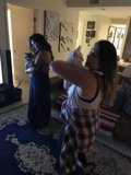 Two Women and a Cat in a Cozy Living Room