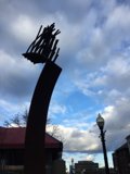 Bird perched before architecture silhouette