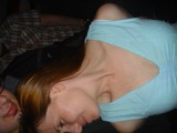 Candid Moment: Woman Resting at Social Gathering