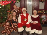 Family Christmas Portrait with Santa and Mrs. Claus