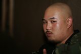 Shaved Headed Man in Black