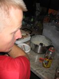 Red-Shirted Man Enjoys a Hearty Meal at the Pub