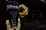 Native American Statue Amidst Nature