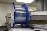 Blue and Clear Plastic Spool