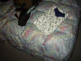 Cozy Bed with Quilt and Bag in Hotel Sungarden Dojima