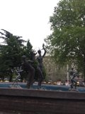 Dancing Figures Against Sky