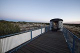 Abandoned Train Car on Desert Observation Deck at Twilight