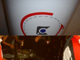 Standing Next to the Sign