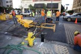 Road Workers Ensuring Safety