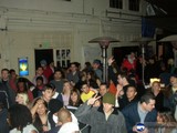 Crowd Gathers Outside Club Renato Garcia