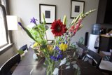 Delicate Flower Arrangement on Wooden Table