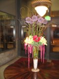 Artistic Flower Arrangement on Wooden Table