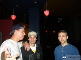 Three Men Enjoying a Night Out at the Bar