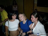 Three Women Having Fun at a Nightclub