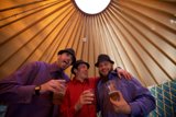 Three Men Cheers-ing at the Wedding