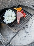 Grilling feast by the rocks