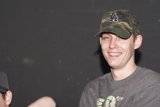 Camo Man with Two Hats