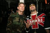 Camouflaged Men Strike a Pose