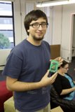 Electronic Device in the Hands of a Confident Man.