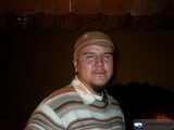 Man in Striped Shirt and Beanie