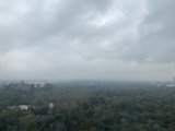 Cloudy Cityscape from a High-Rise Building