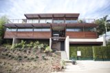 Modern Villa with Expansive Deck and Stairs
