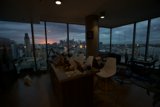 Cityscape View from a Penthouse Living Room