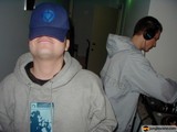 Two Men in Hats and Headphones