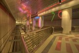 Neon-Framed Escalator Leading to the Terminal