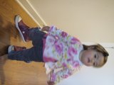Little Girl on Hardwood Floor