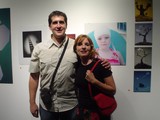 Couple Posing Together at Art Gallery Opening