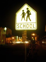 Yellow School Sign Stands Proud