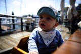 Adorable Baby Moment by the Waterfront
