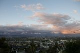 Cloudy Cityscape View from Hillside