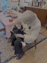 Grandmother's Tender Moment with Baby Grandchild