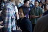 Smiling Couple in a Crowded Room