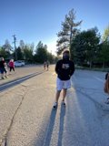 Masked Man in a Parking Lot