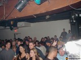 Nightclub Fun with DJ and Crowded Room