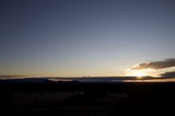 Sunset Over Desert Mountains and Scrubland