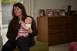 Mother and Newborn in Quiet Domestic Moment