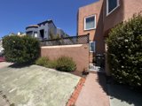 Charming Suburban Home with Ivy Fence