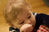 Young Child in Quiet Contemplation on Christmas Morning