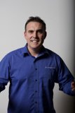The Happy Blue-Shirted Man