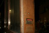 Silent Alarm Activation on a Wooden Door