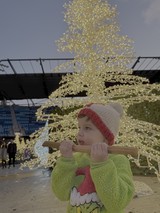 Child Enjoying Holiday Lights Display