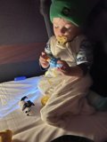 Innocence and Exploration: Baby Wesley's Adventure in Green